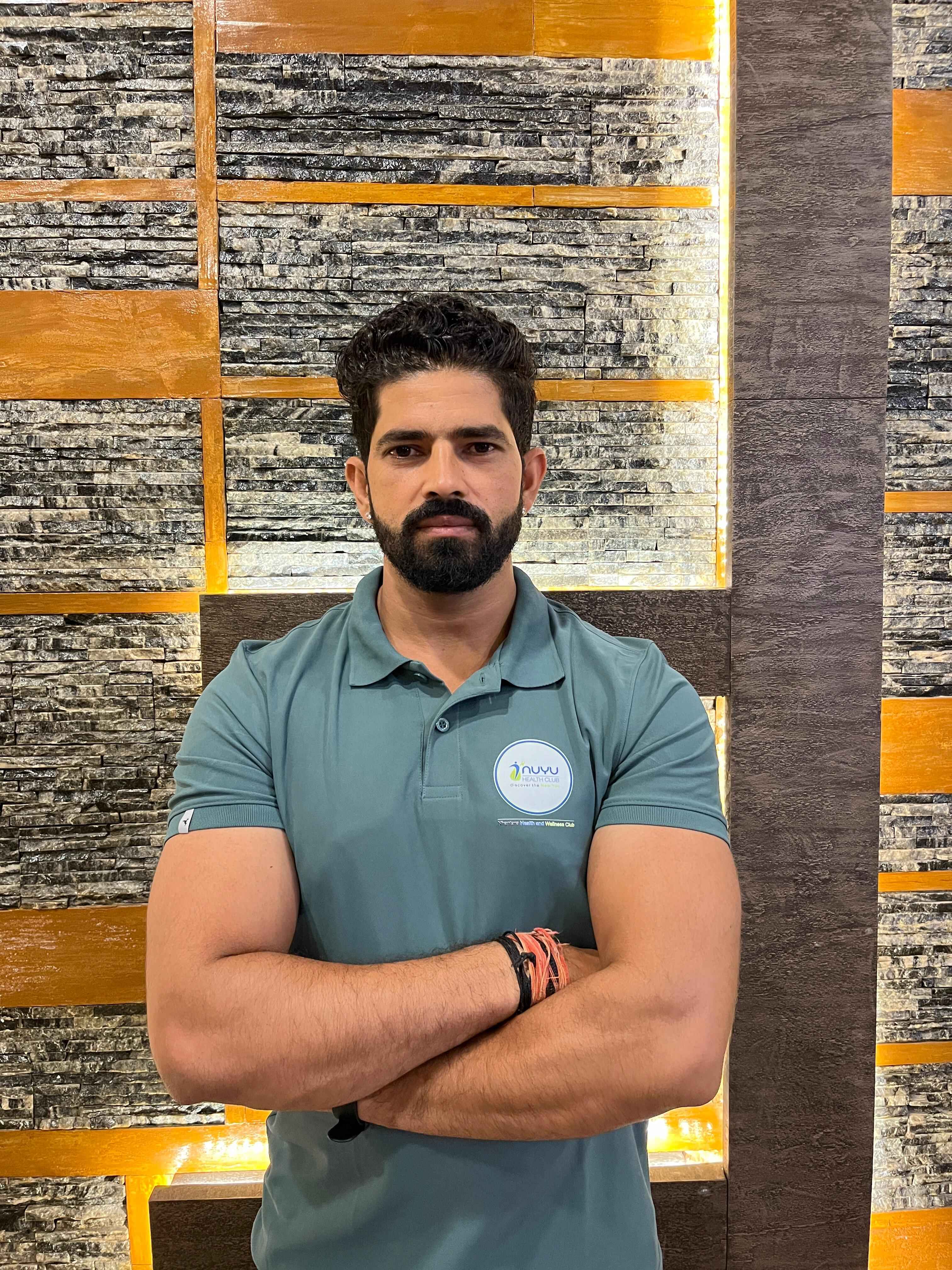 Professional therapist offering massage and recovery treatments at Vaishali Nagar gym